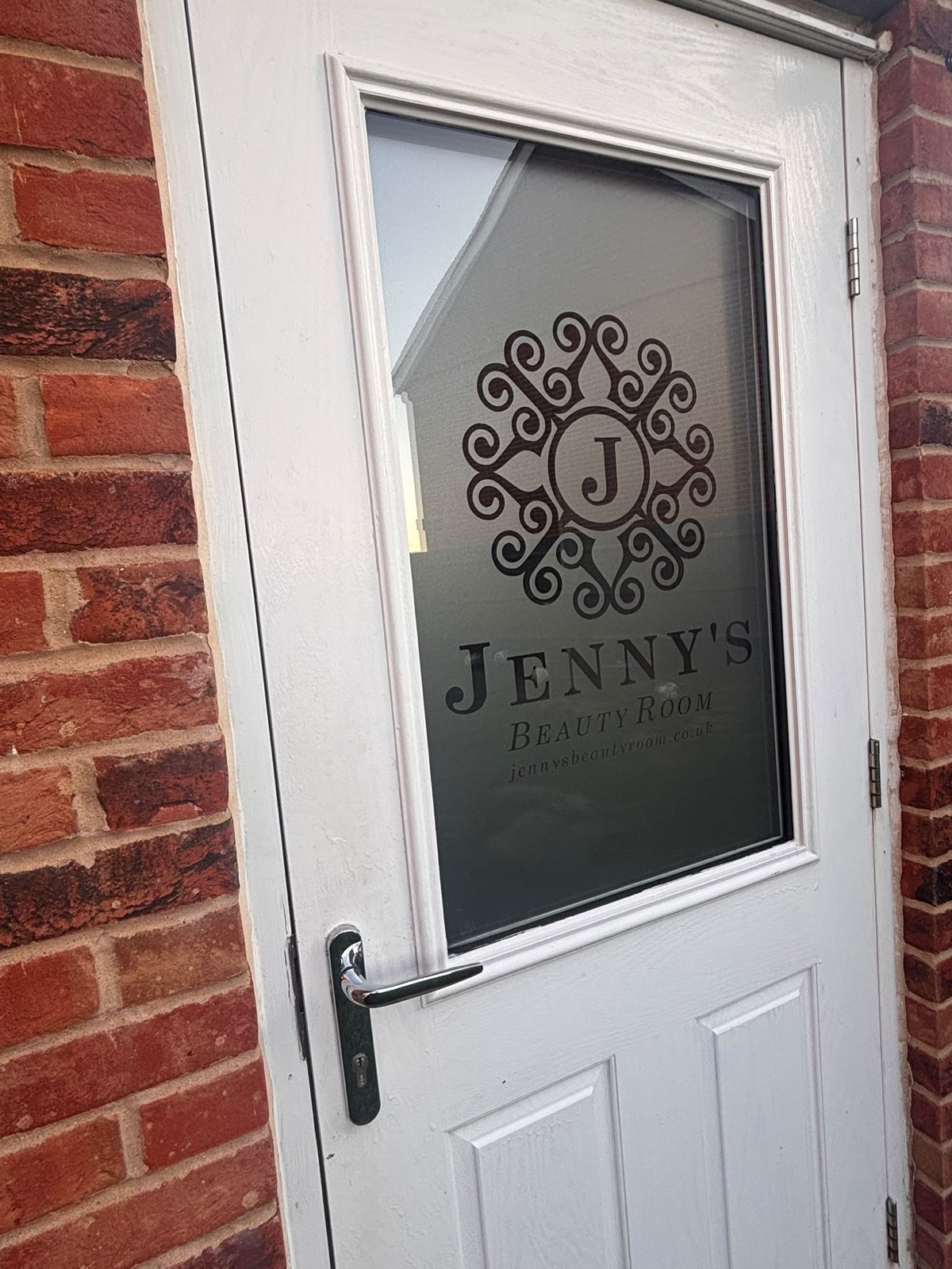 The front door of Jenny's Beauty Room in Horley
